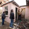 From left: UCR researchers Todd Luce, Catherine Gudis, and David Biggs, examine the exterior of the Case residence.