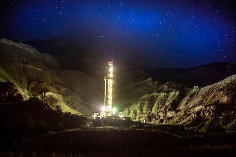 Fracking rig at night