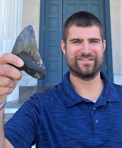 Phillip Sternes and Megalodon tooth