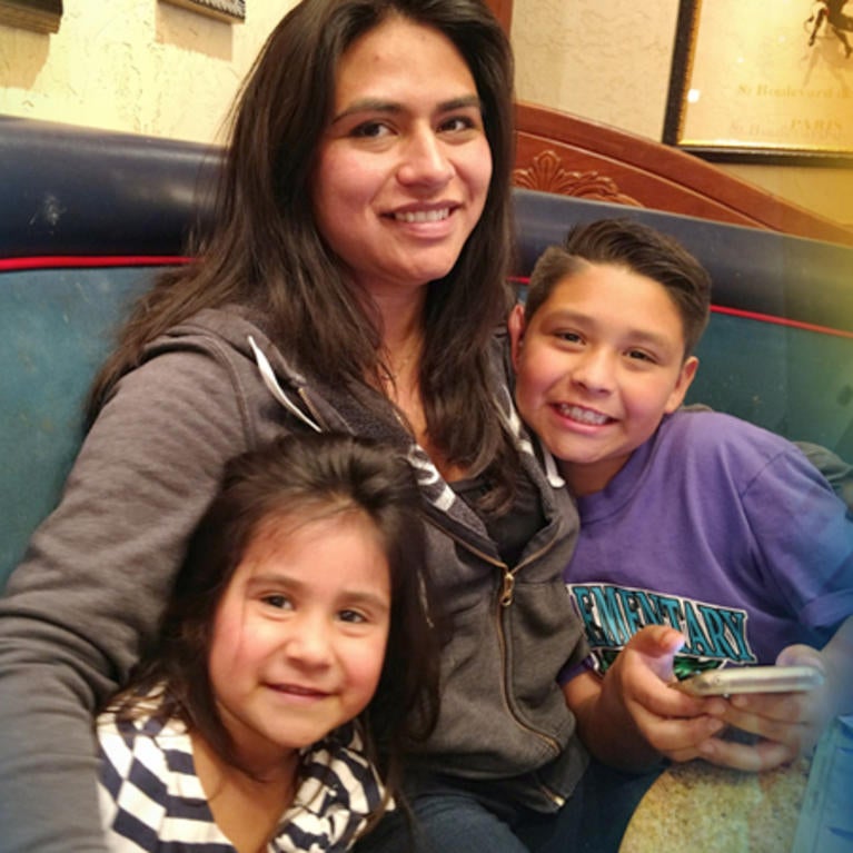 Andrea Cruz Castillo with her children