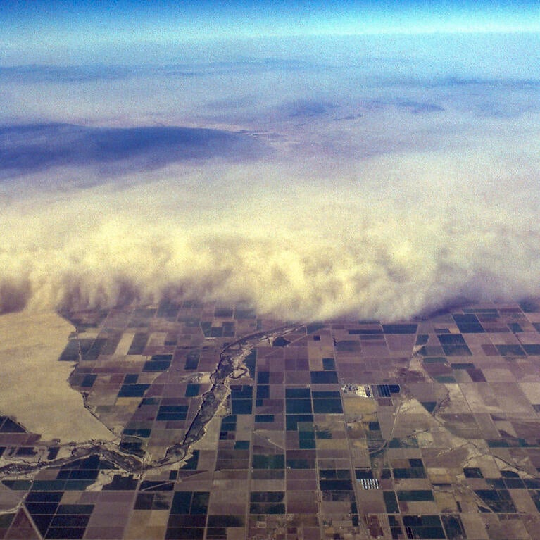Aerial view of dust storm overrunning the Imperial Valley, California. Salton Sea in upper left. 