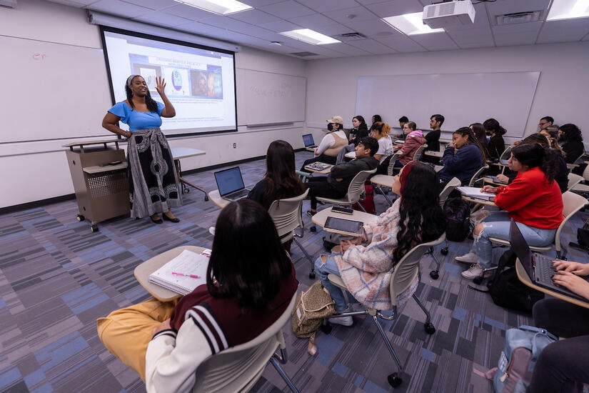 Jalondra Davis, assistant professor of English, lectures on the topic "crossing merfolk" on Monday, February 6, 2023, at UC Riverside. (UCR/Stan Lim)