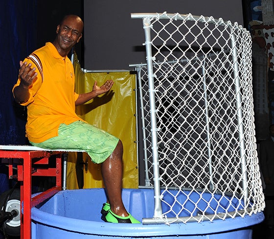Former BET executive Stephen Hill on a dunk tank seat.
