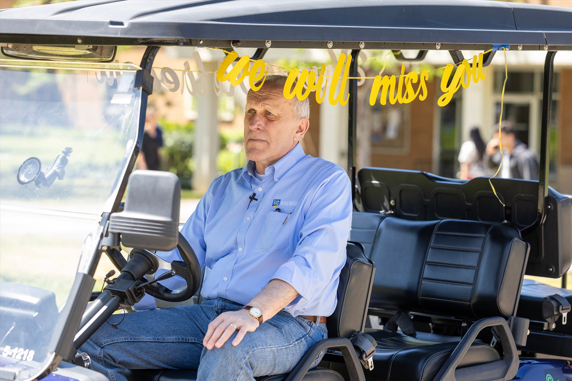 Wilcox rides in a campus golf cart during filming of a final “Wilcox on Wheels” video to say farewell to UCR. Wilcox rides in a campus golf cart during filming of a final “Wilcox on Wheels” video to say farewell to UCR.