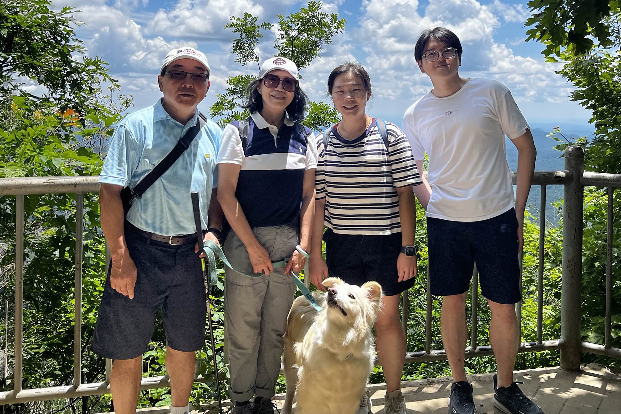 From left: Hu with his wife, Jun Du, daughter, Anna, son, Albert, and their dog, Tails. (Courtesy of the Hu family)