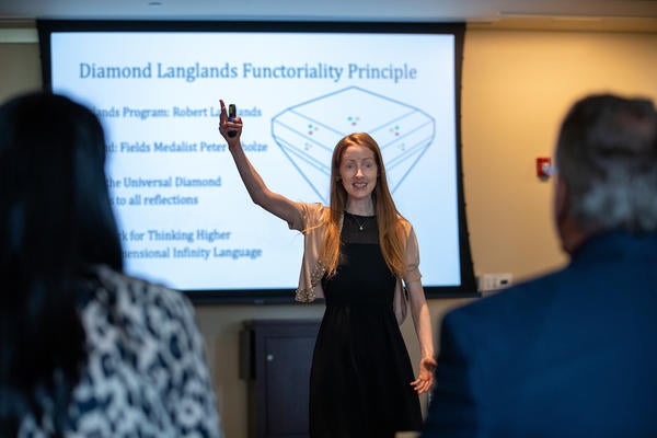 Shanna Dobson, math doctoral student, presents "Diamond Langlands Functoriality: A Universal Language," during the Grad Slam competition on Thursday, March 3, 2022, at the Alumni and Visitors Center at UC Riverside.  (UCR/Stan Lim)