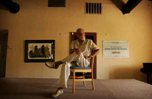 Ernest "Ernie" García, pictured here on September 29, 2016. He is UCR's first Hispanic graduate. Beside being a lifelong educator, he was an arts advocate. García helped spearhead San Bernardino's Garcia Center for the Arts. (Photo by Stan Lim/Digital First Media/The Press-Enterprise via Getty Images)