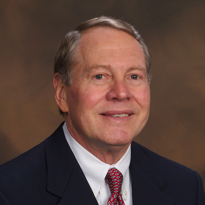 A headshot of John Leonard