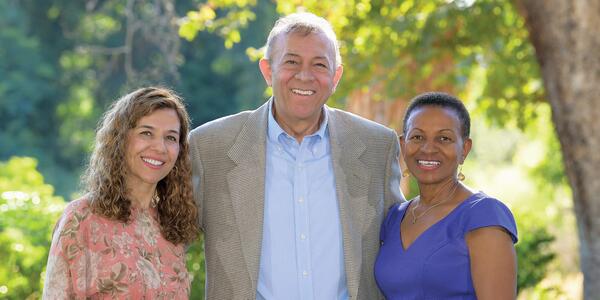  A (From left) Salma Haider, Thomas Haider, and Dean Dr. Deborah Deas.