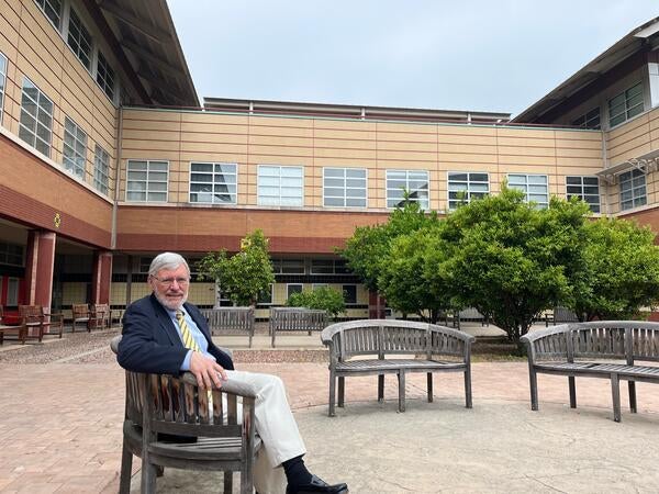 UC Riverside Professor Carl Cranor is retiring from UC Riverside this June. He is a philosophy professor with UCR’s College of Humanities, Arts, and Social Sciences sitting outside of the CHASS building on June 10, 2024. (UCR/Sandra Baltazar Martinez)