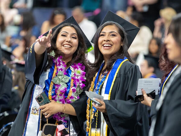 UCR graduates at commencement wearing their philanthropy cord