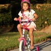 Claire Canale, 4, rides a donated bike on Friday, September 17, 2021 at the Oban Family Housing at UC Riverside. Officers and staff at the University of California Riverside Police Department got together to purchase an assortment of bikes for the children living at the university’s family housing apartment complex. (UCR/Stan Lim)