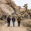 From left: UCR researchers Todd Luce, Catherine Gudis, and David Biggs, walk along a path during a visit to Joshua Tree National Park in February. 