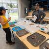 UCR's Nawa Sugiyama and Karl Taube look over ceramic pieces collected from the excavation sites.