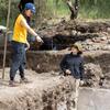 Sugiyama talks with a colleague at an excavation site in Teotihuacan. 