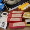 Boxes with 35mm film hold images from various countries. These are part of the Color Film Emergency Project that will be digitized by the UC Riverside team. (UCR/Sandra Baltazar Martínez) 