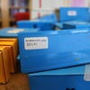 Boxes with 35mm film hold images from Delhi, India. These are part of the Color Film Emergency Project that will be digitized by the UC Riverside team. (UCR/Sandra Baltazar Martínez) 