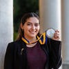 Winner holding medal