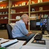 Wilcox conducts a Zoom meeting with his leadership team from his home office during the COVID-19 pandemic in May 2020.
