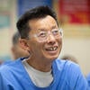 Student Kunio (Kenji) Yanagida smiles during a class led by Amos Lee.