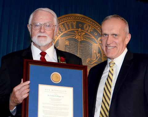 Riggs receiving the UCR medallion