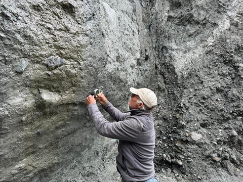 Measuring scratches on the Alpine Fault.