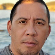 A headshot of Dylan Rodriguez