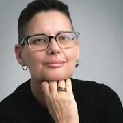 Portrait photo of Caro De Robertis.  ​