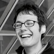 Black-and-white photo of Ilya Kaminsky.