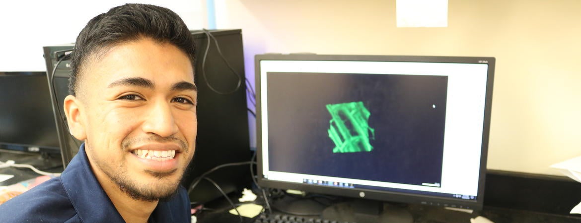 Alejandro Quiñones, 22, uses mathematical modeling to analyze cell division in maize.
