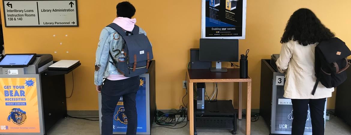 students printing on Wepa kiosks