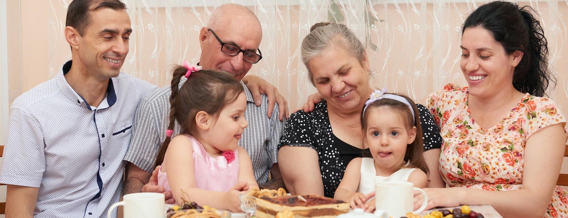 Extended family having tea