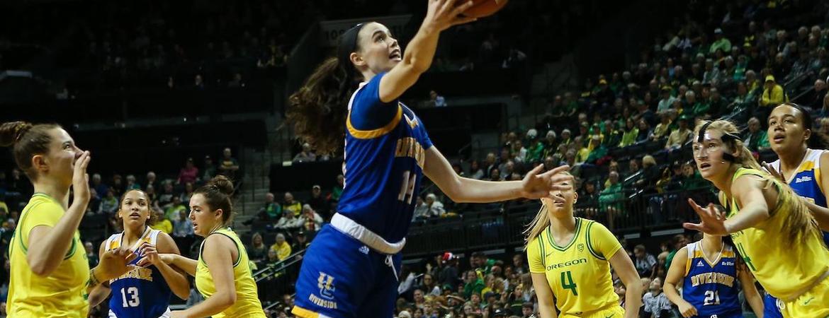 Jannon Otto and the UCR women's basketball team on the court