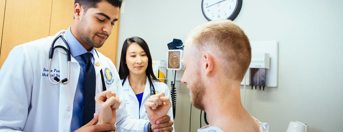 UC Riverside medical students treat a patient 