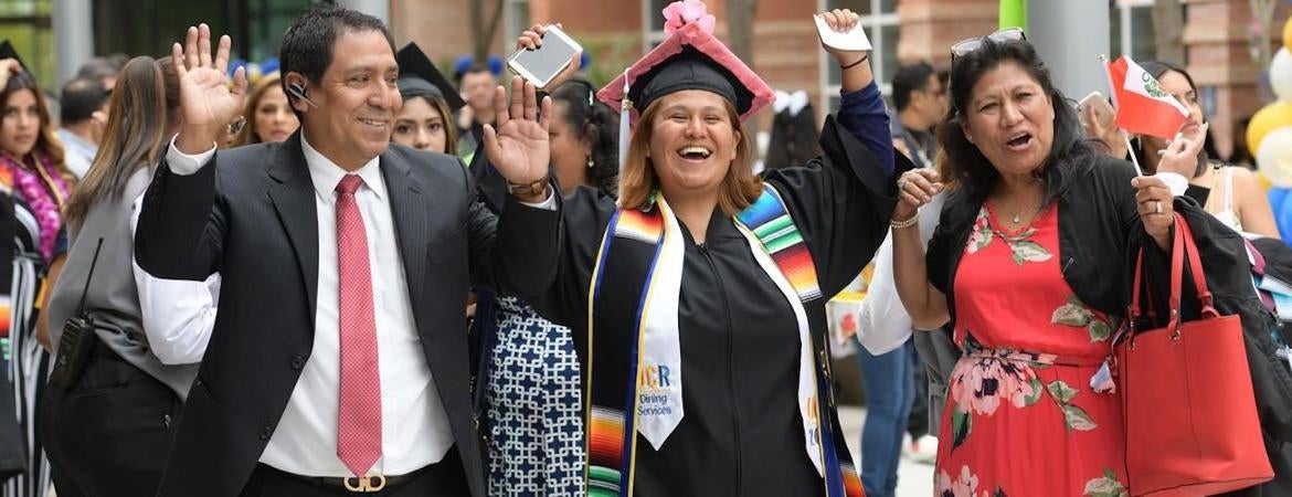 A family cheers on their graduate at the UCR RAZA Graduation ceremony in 2019