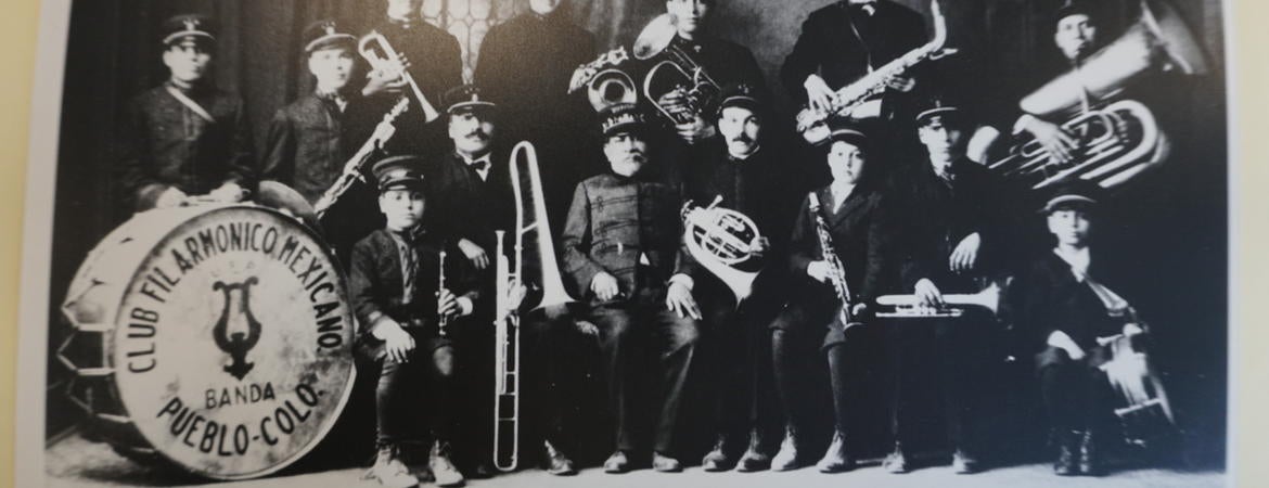 Black and white photo of the "Club Filarmónico Mexicano-Pueblo Colo." band. This photo is courtesy of the “Soundscapes of the People: A Musical Ethnography of Pueblo, Colorado” research. 