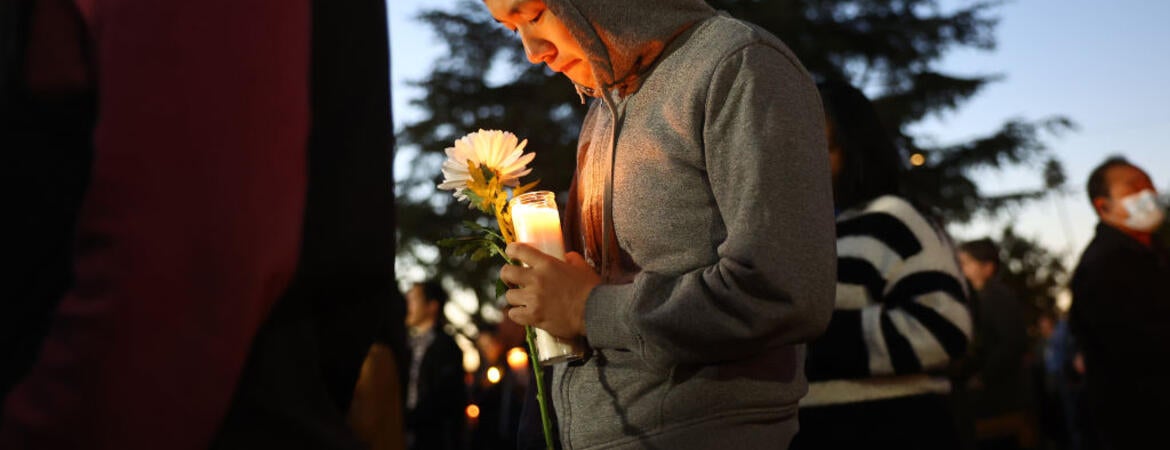 MONTEREY PARK, CALIFORNIA - JANUARY 24: People attend a candlelight vigil for victims of a deadly mass shooting at a ballroom dance studio on January 24, 2023 in Monterey Park, California. Eleven people died and nine more were injured at the studio near a Lunar New Year celebration last Saturday night. Vice President Kamala Harris is scheduled to visit the predominantly Asian American community tomorrow. (Photo by Mario Tama/Getty Images)