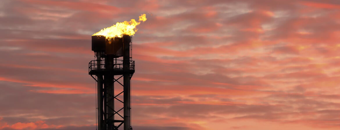 Gas flaring against sky