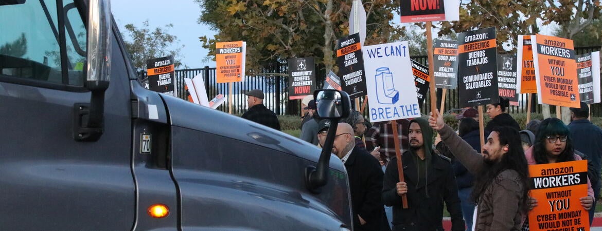 A coalition of labor unions and community-based organizations protest a new Amazon air cargo distribution center in San Bernardino, where air pollution and rates of asthma rank among worst in the nation, 2019. Photo: Courtesy of Anthony Victoria, The Frontline Observer.