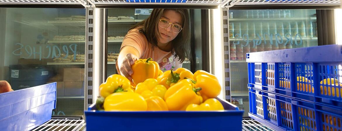 UCR student working at R'Pantry