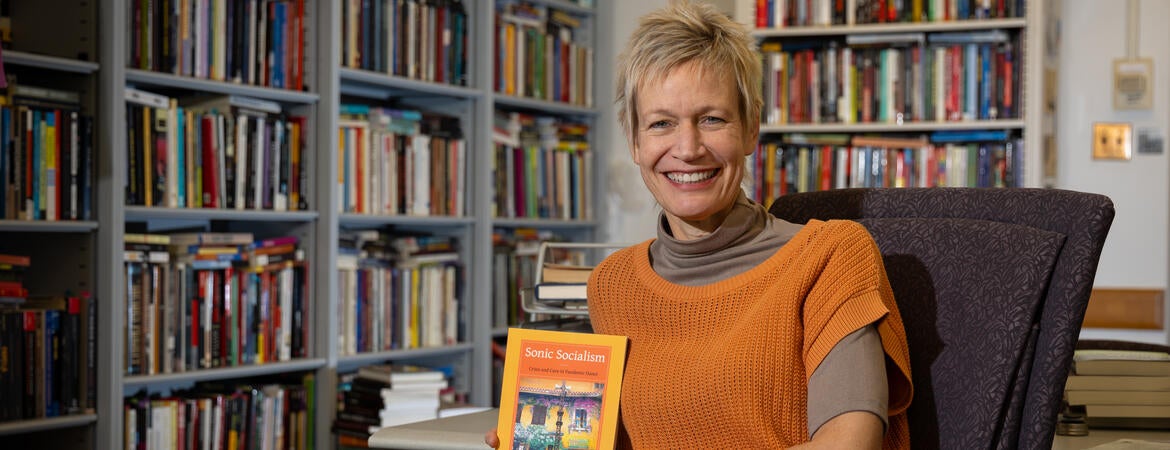Christina Schwenkel with her book
