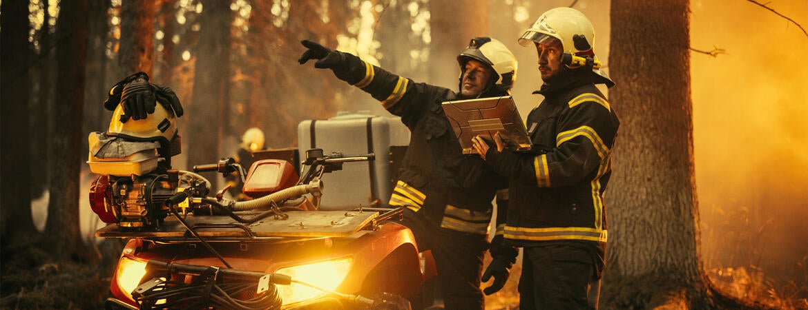 Firefighters with laptop