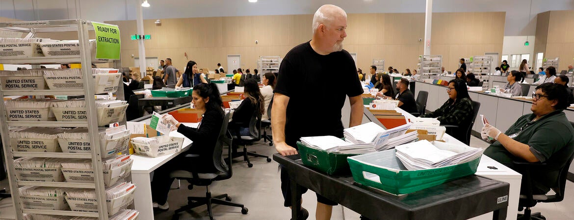 Election workers process ballots for the California state primary election at the Los Angeles County Ballot Processing Center on June 05, 2026 in City of Industry, California.