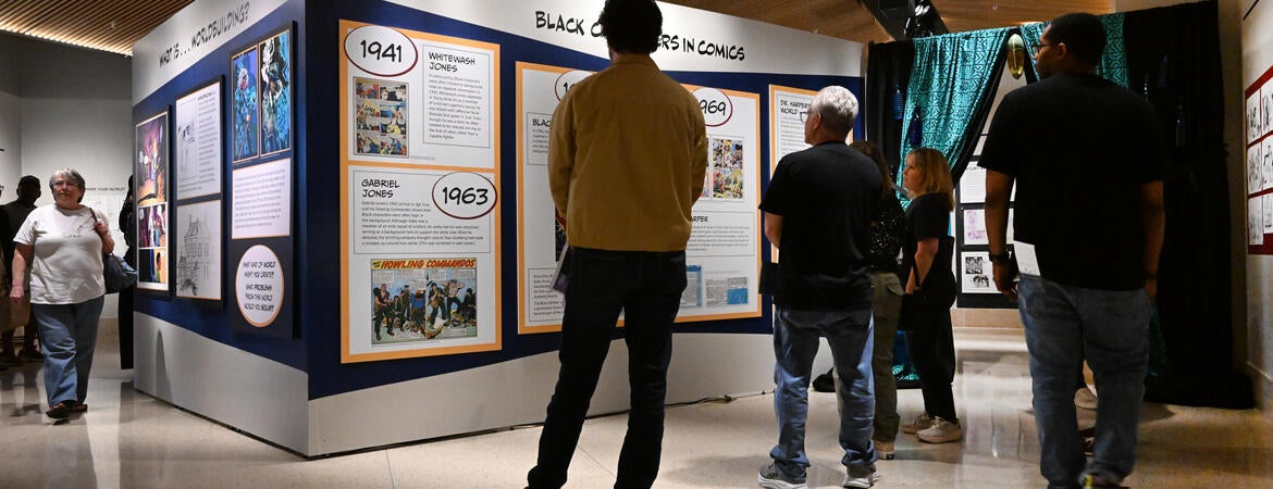 Visitor looks at Jennings exhibit