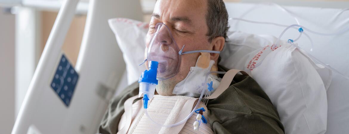 Man using a ventilator in a hospital