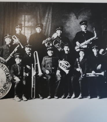 Black and white photo of the "Club Filarmónico Mexicano-Pueblo Colo." band. This photo is courtesy of the “Soundscapes of the People: A Musical Ethnography of Pueblo, Colorado” research. 