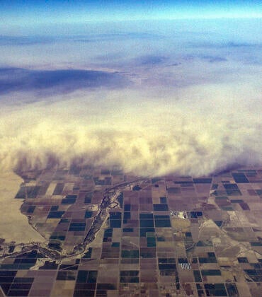 Aerial view of dust storm overrunning the Imperial Valley, California. Salton Sea in upper left. 