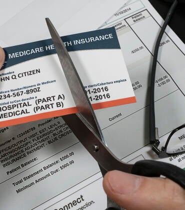 Man cuts fake Medicare card