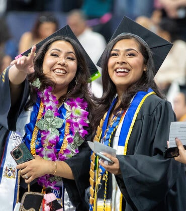 UCR graduates at commencement wearing their philanthropy cord