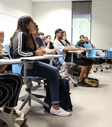A student presents to a class at UC Riverside